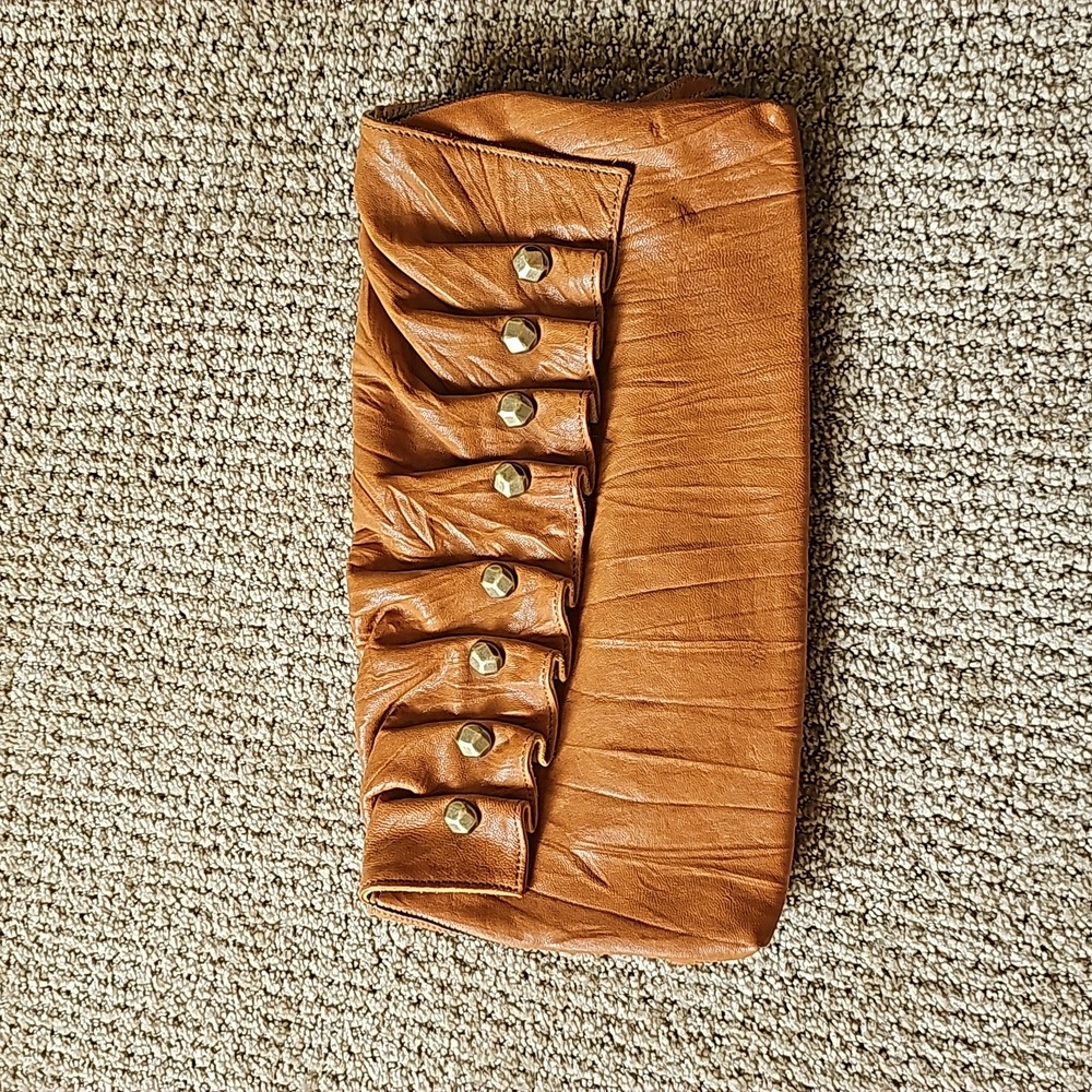 Seven for all mankind mustard leather clutch  . Good condition